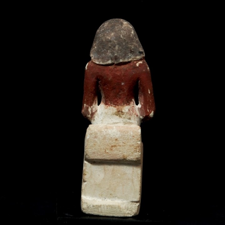 Limestone Figure of a Seated Man